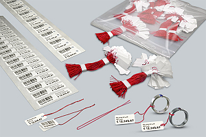 Fäden, vorgeknotet am Halter, im Einsatz an Etiketten - Threads, preknottet on support, in use with labels for threads