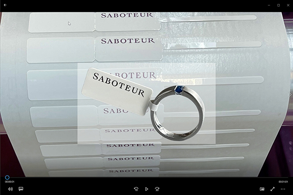 Video Saboteur Schlaufen-Etikett Musa